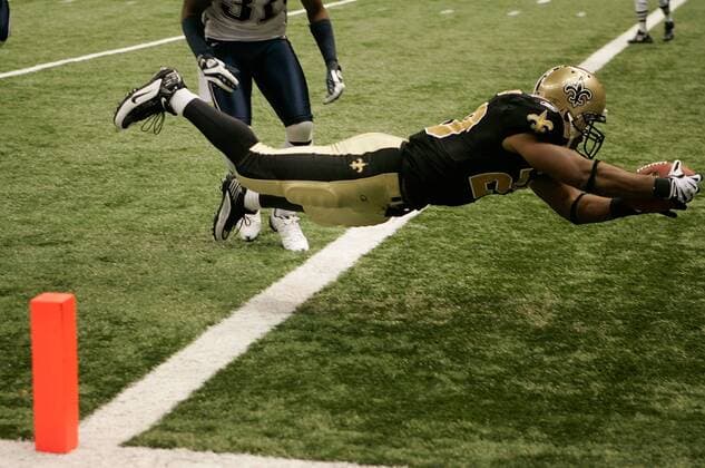 Nov. 30, 2009 - New Orleans, LA, United States - November 30, 2009: Pierre Thomas 23 of the New Orleans Saints scores a touchdown against the New England Patriots during a game in the Louisiana Superdome in New Orleans, LA. - ZUMAck1