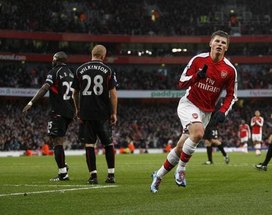 Arsenal s Andrey Arshavin (R) celebrates - Barclays Premier League: Arsenal FC London v Stoke City 5th December, 2009 - EDITORIAL USE ONLY. No use with unauthorised audio, video, data, fixture lists, club league logos or live services. Online in-match use limited to 120 images, no video emulation. No use in betting, games or single club league player publications. o0 Jubel Freude