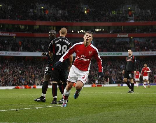 Arsenal s Andrey Arshavin (R) celebrates - Barclays Premier League: Arsenal FC London v Stoke City 5th December, 2009 - EDITORIAL USE ONLY. No use with unauthorised audio, video, data, fixture lists, club league logos or live services. Online in-match use limited to 120 images, no video emulation. No use in betting, games or single club league player publications. o0 Jubel Freude