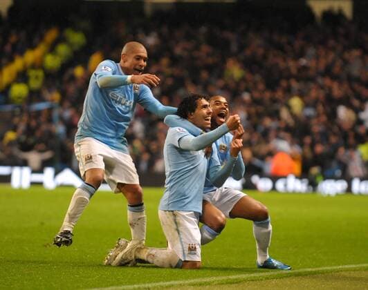 Carlos Tevez of Manchester City (C) celebrates scoring the second goal Barclays Premier League Manchester City v Chelsea 5th December, 2009 EDITORIAL USE ONLY. No use with unauthorised audio, video, data, fixture lists, club league logos or live services. Online in-match use limited to 120 images, no video emulation. No use in betting, games or single club league player publications. o0 Freude Jubel