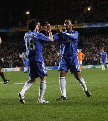FC Chelsea London s Didier Drogba (R) celebrates with Yuri Zhirkov UEFA Champions League Group D Chelsea v Appoel Nicosia 8th December, 2009 EDITORIAL USE ONLY. No use with unauthorised audio, video, data, fixture lists, club league logos or live services. Online in-match use limited to 120 images, no video emulation. No use in betting, games or single club league player publications.