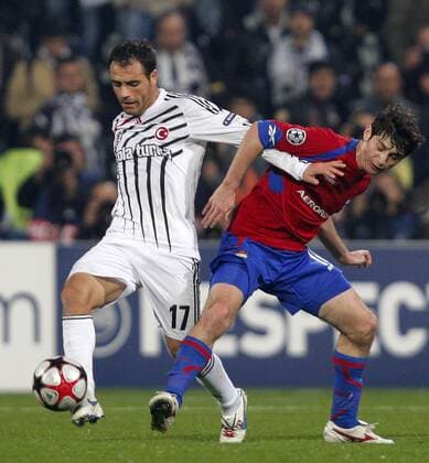 Besiktas Istanbul - CSKA Moscow; Ekrem Dag (L) of Besktas and Pavel Mamaev (R) of CSKA Moscow. 