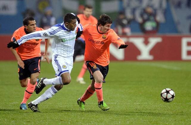 Lionel Messi (R) gegen Betao - Dynamo Kiew (weiß) - FC Barcelona (orange) - 