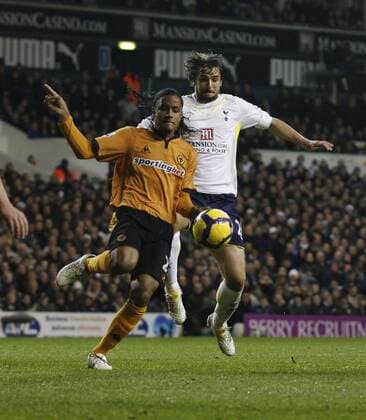 Tottenham s Nico Kranjcar (R) tussles with Wolverhampton s Michael Mancienne Barclays Premier League Tottenham Hotspur v Wolverhampton Wanderers 12th December, 2009 EDITORIAL USE ONLY. No use with unauthorised audio, video, data, fixture lists, club league logos or live services. Online in-match use limited to 120 images, no video emulation. No use in betting, games or single club league player publications.
