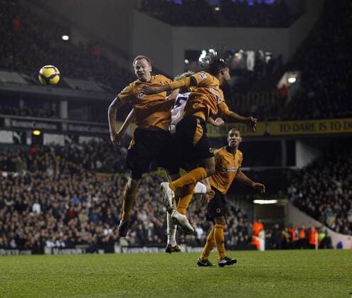 Wolverhampton s Jody Craddock (L) clears his lines Barclays Premier League Tottenham Hotspur v Wolverhampton Wanderers 12th December, 2009 EDITORIAL USE ONLY. No use with unauthorised audio, video, data, fixture lists, club league logos or live services. Online in-match use limited to 120 images, no video emulation. No use in betting, games or single club league player publications.