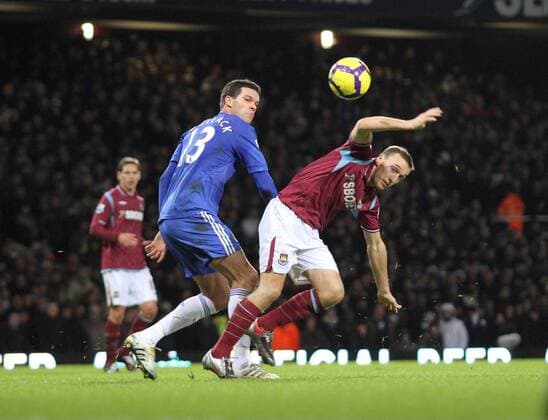 West Ham s Mark Noble (R) tussles with Chelsea s Michael Ballack - Premier League West Ham United v FC Chelsea London 20th December, 2009 EDITORIAL USE ONLY. No use with unauthorised audio, video, data, fixture lists, club league logos or live services. Online in-match use limited to 120 images, no video emulation. No use in betting, games or single club league player publications.