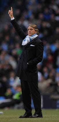 The only way is up for Roberto Mancini coach of Manchester City Barclays Premier League Manchester City v Stoke City 26th December, 2009 EDITORIAL USE ONLY. No use with unauthorised audio, video, data, fixture lists, club league logos or live services. Online in-match use limited to 120 images, no video emulation. No use in betting, games or single club league player publications.