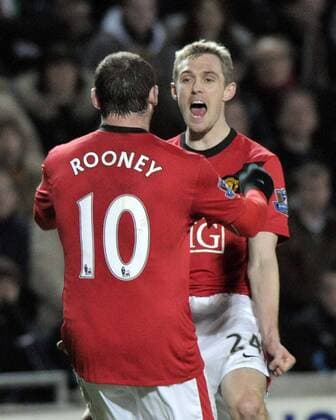 Manchester United s Wayne Rooney (L) celebrates his goal with Darren Fletcher. Barclays Premier League Hull City v Manchester United 27th December, 2009 EDITORIAL USE ONLY. No use with unauthorised audio, video, data, fixture lists, club league logos or live services. Online in-match use limited to 120 images, no video emulation. No use in betting, games or single club league player publications. o0 Jubel, Freude