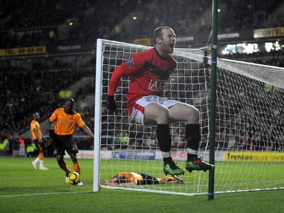 Wayne Rooney of Manchester United celebrates --- Premier League: Hull City (orange) vs. Manchester United (red), 27th December, 2009 EDITORIAL USE ONLY. No use with unauthorised audio, video, data, fixture lists, club league logos or live services. Online in-match use limited to 120 images, no video emulation. No use in betting, games or single club league player publications. o0 Jubel Freude