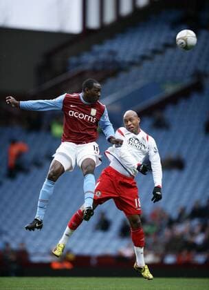 Emile Heskey (L) of Aston Villa and El-Hadji Diouf of Blackburn EON FA Cup 3rd Round Aston Villa v Blackburn Rovers 2nd January, 2010 EDITORIAL USE ONLY. No use with unauthorised audio, video, data, fixture lists, club league logos or live services. Online in-match use limited to 120 images, no video emulation. No use in betting, games or single club league player publications.