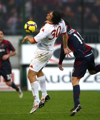 Cagliari Calcio (rot) - AS Rom (weiß) Luca TONI (L) - ginoxmancini