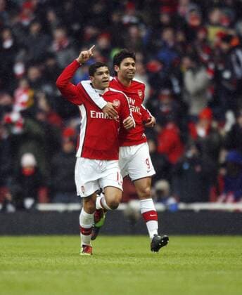 Arsenal FC London s Denilson (L) celebrates - Barclays Premier League Arsenal v Everton 9th January, 2010 EDITORIAL USE ONLY. No use with unauthorised audio, video, data, fixture lists, club league logos or live services. Online in-match use limited to 120 images, no video emulation. No use in betting, games or single club league player publications.