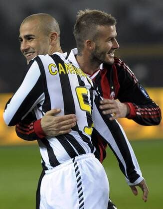 Fabio Cannavaro (Juventus, L) und David Beckham (Milan) - Juventus Turin (weiß) vs AC Milan (rot) - . giorgioxperottino o0 Harmonie Kameradschaft