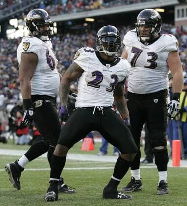 Baltimore Ravens running back Willis McGahee (23) celebrates in the end zone with teammates center Chris Chester (65) and guard Marshal Yanda (73) after scoring in the third quarter against the New England Patriots in the AFC Wildcard game at Gillette Stadium in Foxboro, Massachusetts on January 10, 2010. The Ravens defeated the Patriots 33-14.  BOS2010011020