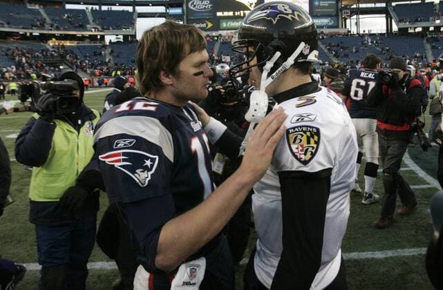 New England Patriots quarterback Tom Brady (12) shakes hands with Baltimore Ravens quarterback Joe Flacco (5) after the AFC Wildcard game at Gillette Stadium in Foxboro, Massachusetts on January 10, 2010. The Ravens defeated the Patriots 33-14.  BOS2010011015