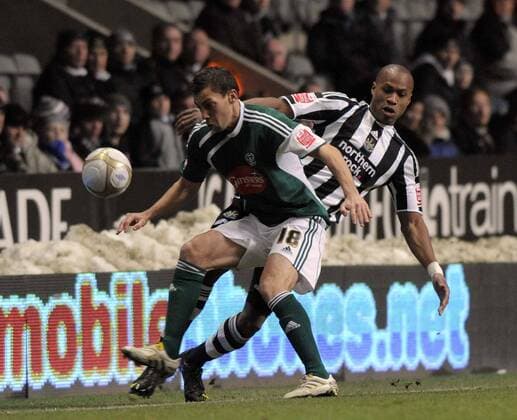 Newcastle s Fabrice Pancrate and Plymouth s Gary Sawyer. FA Cup 3rd Round replay Newcastle United v Plymouth Argyle 13th January, 2010 EDITORIAL USE ONLY. No use with unauthorised audio, video, data, fixture lists, club league logos or live services. Online in-match use limited to 120 images, no video emulation. No use in betting, games or single club league player publications.
