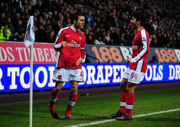 Cesc Fabregas of Arsenal London (L) celebrates scoring the first goal Barclays Premier League Bolton Wanderers v Arsenal 17th January, 2010 EDITORIAL USE ONLY. No use with unauthorised audio, video, data, fixture lists, club league logos or live services. Online in-match use limited to 120 images, no video emulation. No use in betting, games or single club league player publications. o0 Freude Jubel