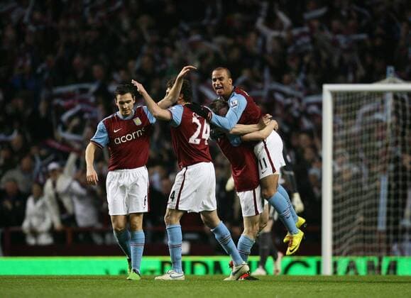 James Milner (2R) hoists Gabriel Agbonlahor (R) skywards after scoring his (MiIlner s) second goal of the game Carling Cup Semi Final 2nd Leg Aston Villa v Blackburn Rovers 20th January, 2010 EDITORIAL USE ONLY. No use with unauthorised audio, video, data, fixture lists, club league logos or live services. Online in-match use limited to 120 images, no video emulation. No use in betting, games or single club league player publications. o0 Jubel, Freude