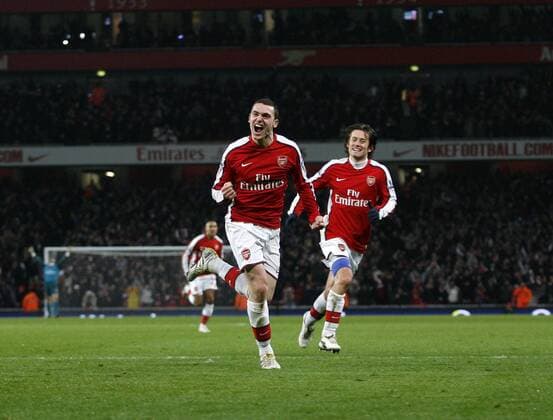 Arsenal s Thomas Vermaelen celebrates scoring his sides third goal Arsenal FC London (red) vs. Bolton Wanderers (blue) EDITORIAL USE ONLY. No use with unauthorised audio, video, data, fixture lists, club league logos or live services. Online in-match use limited to 120 images, no video emulation. No use in betting, games or single club league player publications. o0 Jubel, Freude