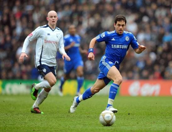 Joe Cole (R) of Chelsea FC runs onto a ball in front of Richard Chaplow of Preston North End EON FA Cup 4th Round Preston North End v Chelsea 23rd January, 2010 EDITORIAL USE ONLY. No use with unauthorised audio, video, data, fixture lists, club league logos or live services. Online in-match use limited to 120 images, no video emulation. No use in betting, games or single club league player publications.