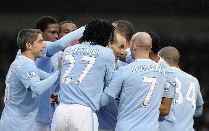 Manchester City s Martin Petrov (C) celebrates his first goal with team mates. EON FA Cup 4th Round Scunthorpe United v Manchester City 24th January, 2010 EDITORIAL USE ONLY. No use with unauthorised audio, video, data, fixture lists, club league logos or live services. Online in-match use limited to 120 images, no video emulation. No use in betting, games or single club league player publications. o0 Jubel, Freude