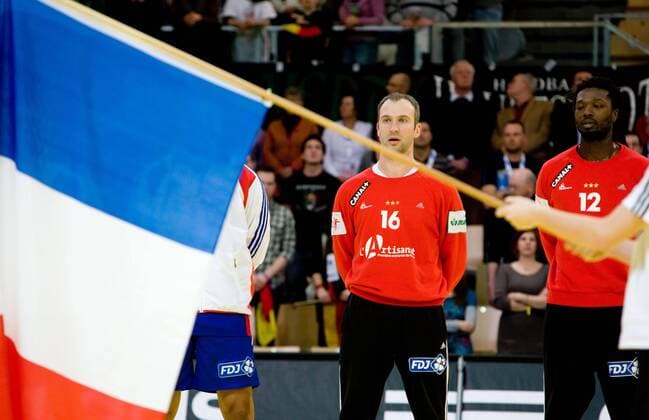Thierry Omeyer of France singing national anthemn the Men s Handball European Championship Main Round match between Germany and France Innsbruck,.  o0 Fahne, Nationalfahne