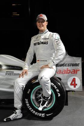 Michael SCHUMACHER (GER) sitzt auf dem Hinterrad seines Boliden. Teamvorstellung Mercedes GP Petronas am 25.01.2010. Stuttgart
