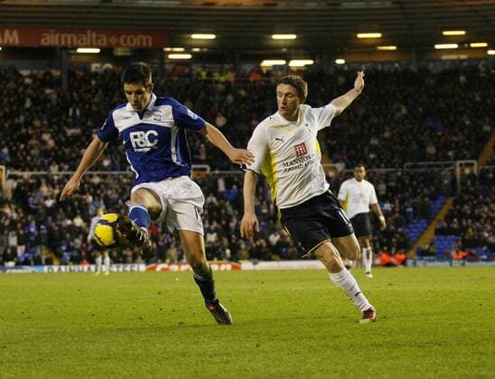 Birmingham s Scott Dann (L) tussles with Tottenham s Robbie Keane Barclays Premier League Birmingham City v Tottenham Hotspur 30th January, 2010 EDITORIAL USE ONLY. No use with unauthorised audio, video, data, fixture lists, club league logos or live services. Online in-match use limited to 120 images, no video emulation. No use in betting, games or single club league player publications.