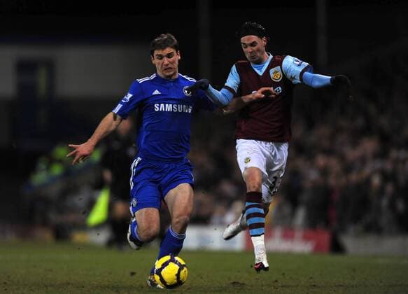 Branislav Ivanovic (L) of Chelsea FC challenges Chris Eagles of Burnley Barclays Premier League Burnley v Chelsea 30th January, 2010 EDITORIAL USE ONLY. No use with unauthorised audio, video, data, fixture lists, club league logos or live services. Online in-match use limited to 120 images, no video emulation. No use in betting, games or single club league player publications.