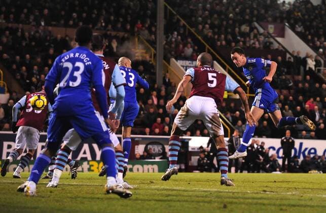 John Terry (R) of Chelsea FC heads through a crowd of players for the second goal Barclays Premier League Burnley v Chelsea 30th January, 2010 EDITORIAL USE ONLY. No use with unauthorised audio, video, data, fixture lists, club league logos or live services. Online in-match use limited to 120 images, no video emulation. No use in betting, games or single club league player publications. o0 Tor