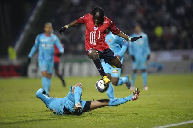 OSC LILLE (Rot) vs RC LENS (Blau): - L1 - 30.01.2010 - DUEL GERVINHO r. vs Adil HERMACH JBAUTISSIER 