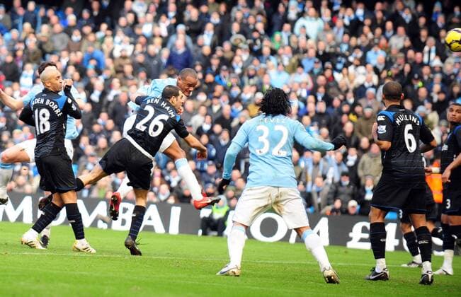 Vincent Kompany (4L) of Manchester City heads the second goal Barclays Premier League Manchester City v FC Portsmouth 31st January, 2010 EDITORIAL USE ONLY. No use with unauthorised audio, video, data, fixture lists, club league logos or live services. Online in-match use limited to 120 images, no video emulation. No use in betting, games or single club league player publications. o0 Tor
