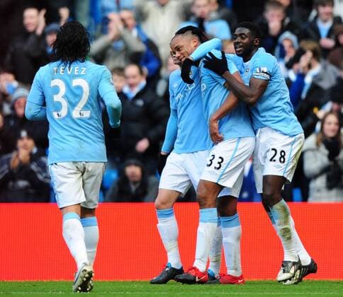 Vincent Kompany (2R) of Manchester City celebrates scoring the second goal Barclays Premier League Manchester City v FC Portsmouth 31st January, 2010 EDITORIAL USE ONLY. No use with unauthorised audio, video, data, fixture lists, club league logos or live services. Online in-match use limited to 120 images, no video emulation. No use in betting, games or single club league player publications. o0 Jubel Freude