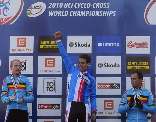 Zdenek Stybar from Czech Republic, centre, celebrates after he won the Men Cyclocross World Championships in Tabor, Czech Republic, on Sunday, Jan. 31, 2010. Klaas Vantornout, left, placed second, Sven Nys, right, placed third, both from Belgium. (CTKxPhoto DavidxVeis)  VEI 18 o0 Jubel, Freude, Sieg, Sieger, Weltmeister, Siegerehrung,