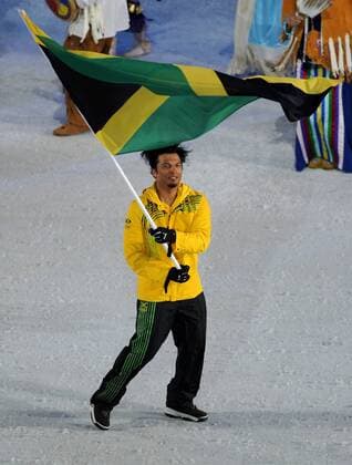 Feb. 12, 2010 - Vancouver, BC - VANCOUVER, B.C.: FEBRUARY 12, 2010 -- Errol Kerr from Jamaica carries his country s flag at the opening ceremony of the 2010 Winter Olympic Games held at B.C. Place in Vancouver February 12, 2010. - ZUMAw51 o0 Delegation Einmarsch Kurios