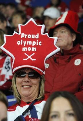 Feb 15, 2010 - Vancouver, British Columbia, Canada - Haley Irwin s mom, Kerry, sits in the stands prior to the start of Canada Vs Switzerland in Women s Hockey at Thunderbird Stadium at the Vancouver 2010 Winter Olympic Games.  - ZUMA o0 kurios Mutter privat Familie Hut Kopfbedeckung Zuschauer