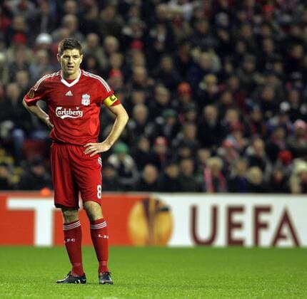 Liverpool s Steven Gerrard looks dejected early in the game. UEFA Europa League round of 32, FC Liverpool (red) vs FC Unirea Urziceni (white), 18th February, 2010 EDITORIAL USE ONLY. No use with unauthorised audio, video, data, fixture lists, club league logos or live services. Online in-match use limited to 120 images, no video emulation. No use in betting, games or single club league player publications. Schriftzug