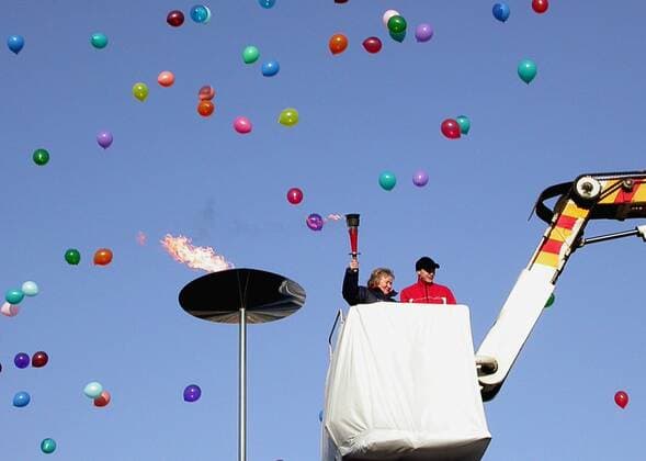 CHELYABINSK, RUSSIA. FEBRUARY 29. Lidiya Skoblikova lighting with the help of an aerial lift the symbolic fire of the First Winter Spartakiade of Russian Students that opened in Chelyabinsk.  TASS113029