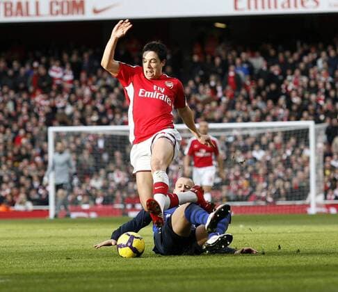 Arsenal s Samir Nasri (L) goes past Sunderland s Alan Hutton Barclays Premier League FC Arsenal v AFC Sunderland 20th February, 2010 EDITORIAL USE ONLY. No use with unauthorised audio, video, data, fixture lists, club league logos or live services. Online in-match use limited to 120 images, no video emulation. No use in betting, games or single club league player publications.
