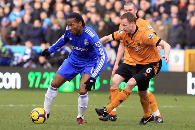 Chelsea s Didier Drogba (L) holds off Wolverhampton Wanderers s Jody Craddock Barclays Premier League Wolverhampton Wanderers v FC Chelsea 20th February, 2010 EDITORIAL USE ONLY. No use with unauthorised audio, video, data, fixture lists, club league logos or live services. Online in-match use limited to 120 images, no video emulation. No use in betting, games or single club league player publications.