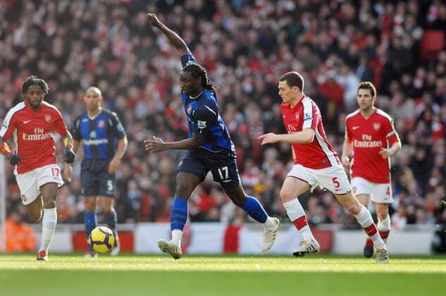 Thomas Vermaelen (Arsenal, R) and Kenwyne Jones (Sunderland) Arsenal FC London - Sunderland AFC - 