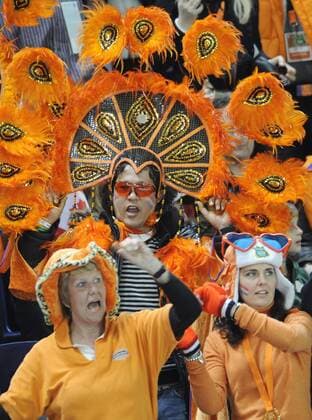 Fans of the Netherlands support athletes at the men s 1500 metres speed skating race at the Richmond Olympic Oval during the Vancouver 2010 Winter Olympics.  RE0C8C61 o0 Freude kurios Outfit o00 KostÃ¼m