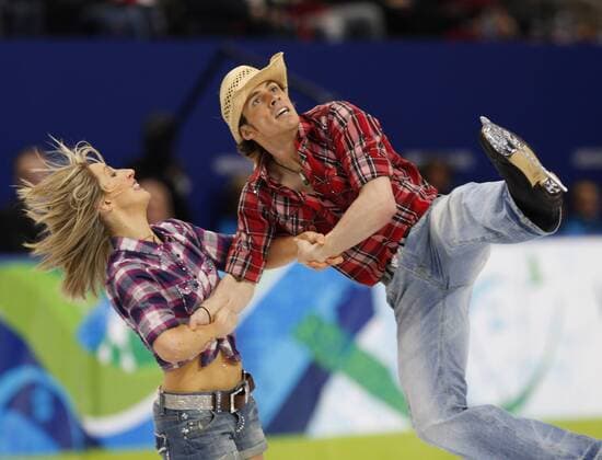 Sinead Kerr (L) and John Kerr of Great Britain skate during their original dance program in the ice dancing competition at the 2010 Winter Olympics in Vancouver, Canada on February 21, 2010.  BKX2010022159