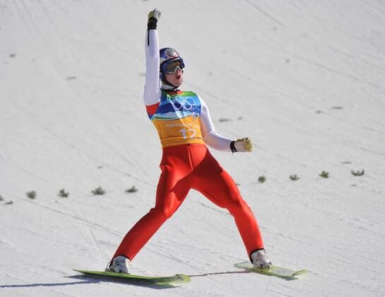 Austria s Thomas Morgenstern celebrates as he lands his final jump in the Men s Team Ski Jump during the 2010 Vancouver Winter Olympics in Whistler -  OLY20100222316 o0 Freude Jubel