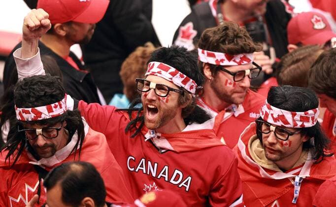 Feb. 24, 2010 - Vancouver, BC, Canada - VANCOUVER, BC: FEBRUARY 24, 2010 -- Team Canada hockey fans dressed as the Hanson brothers make their way to their seats prior to Canada s game in men s hockey game in Vancouver BC Wednesday, February 24, 2010 during the 2010 Olympics. - ZUMAw51