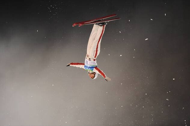 Feb. 25, 2010 - West Vancouver, BC, Canada - WEST VANCOUVER, BC: FEBRUARY 25, 2010 -- Kyle Nissen from Canada makes his first of two jumps during the men s aerials competition during the Vancouver 2010 Olympic Winter Games Canada at Cypress Mountain in West Vancouver, BC Thursday, February 25, 2010. - ZUMAw51