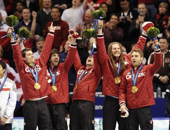 Canadian skaters Guilaume Bastille (L), Charles Hamelin (2nd L), Francois Hamelin (C), Jean Olivier (2nd R) , Francois-Louis Tremblay (R) celebrate their goldmedals for the men s 5000 M relay short track speed skating - - ZUMAw51 o00 gold goldmedaille medaille o0 Jubel Freude Sieg Olympiasieg