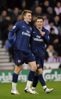Nicklas Bendtner l. of Arsenal FC London celebrates his goal with Aaron Ramsey of Arsenal FC London Barclays Premier League Stoke City v Arsenal FC London 27th February, 2010 EDITORIAL USE ONLY. No use with unauthorised audio, video, data, fixture lists, club league logos or live services. Online in-match use limited to 120 images, no video emulation. No use in betting, games or single club league player publications. o0 Jubel Freude