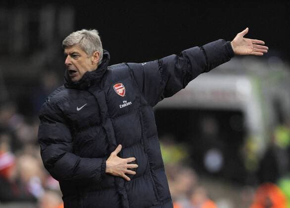 Arsene Wenger Coach of Arsenal FC London reatcs during the game Barclays Premier League Stoke City v Arsenal FC London 27th February, 2010 EDITORIAL USE ONLY. No use with unauthorised audio, video, data, fixture lists, club league logos or live services. Online in-match use limited to 120 images, no video emulation. No use in betting, games or single club league player publications.
