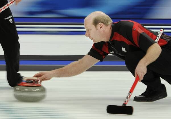 Feb. 27, 2010 - Vancouver, BC, Canada - VANCOUVER, BC: FEBRUARY 27, 2010 -- Canada s skip Kevin Martin delivers a rock during the men s Olympic curling goldmedal game against Norway at the Vancouver Olympic Centre on Day 16 of the 2010 Winter Olympic Games in Vancouver, BC February 27, 2010. - ZUMAw51